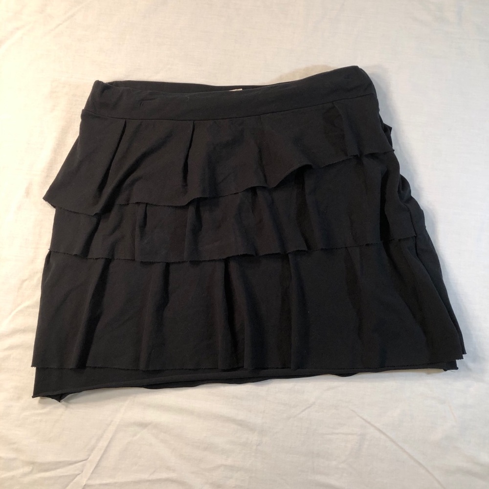 Black ruffled knit mini skirt